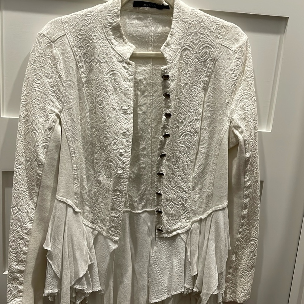 Fitted blouse or light jacket. Perfect for fall and warmer winters.